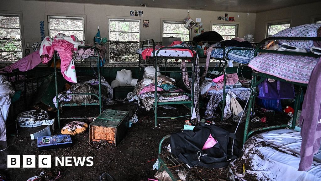 Frantic survivors of the diluted survivors that kills 32, including 14 children
