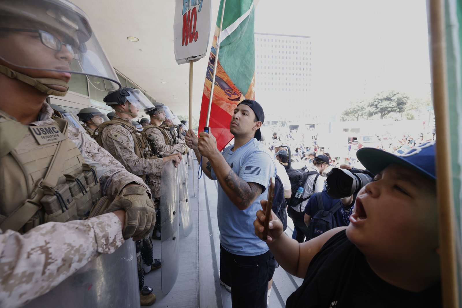 Trump administrator declares "illegal assembly" as the protestors and anti-ice marines and marines met